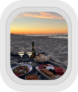 Beach picnic at sunset