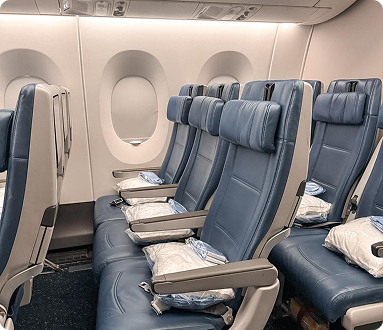 Airplane cabin seats with pillows